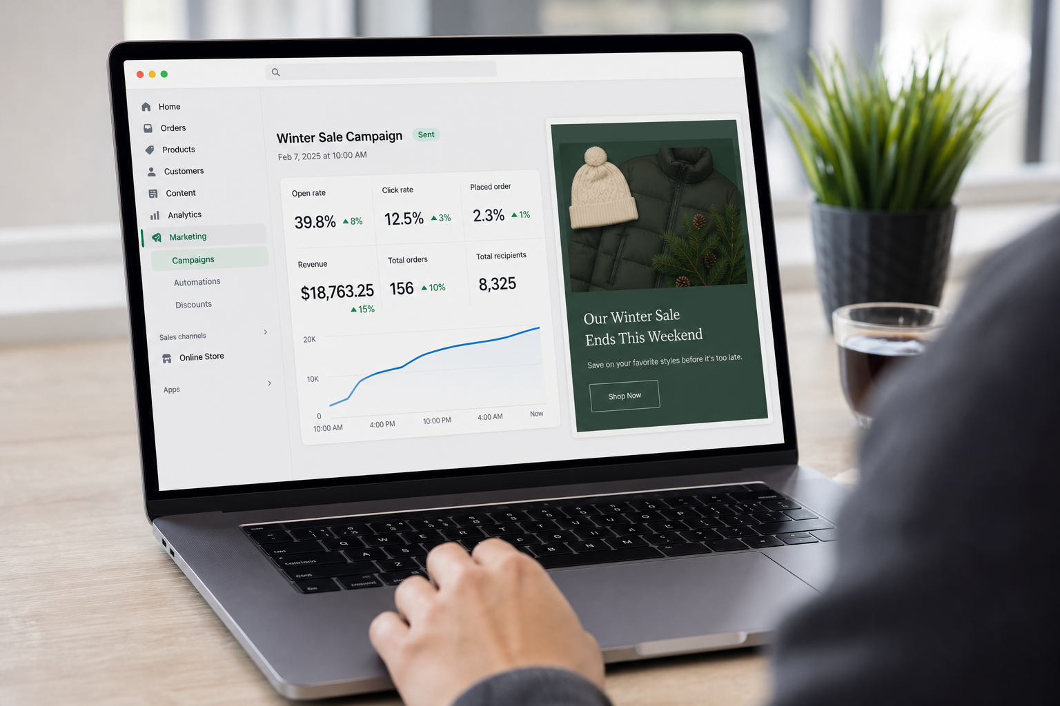 Shopify ecommerce dashboard showing an email campaign performance report with open rates, revenue stats, and a branded promotional email displayed on a laptop screen in a clean workspace